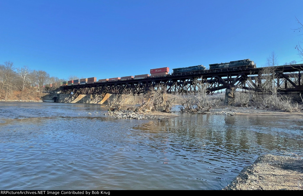 NS 9851 leads train symbol 23M across the Delaware River from Phillipsburg, NJ (left) to Easton, PA  )(right)
